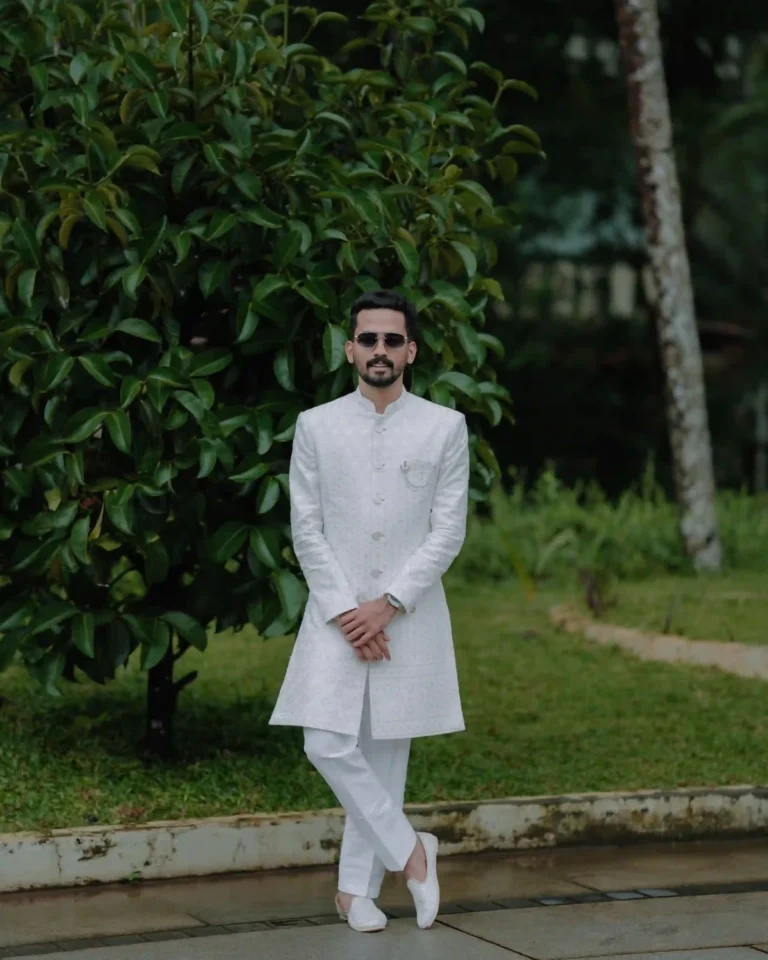 wedding photography in calicut , groom in white kurta