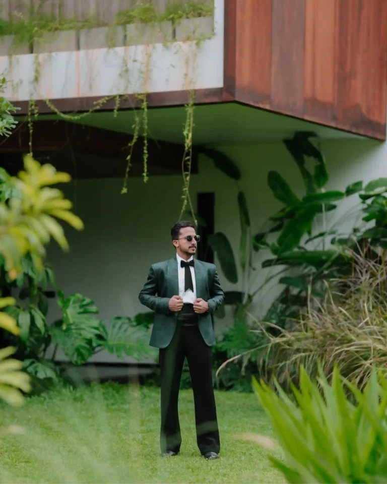 wedding photography in calicut , stylish groom posing for photo