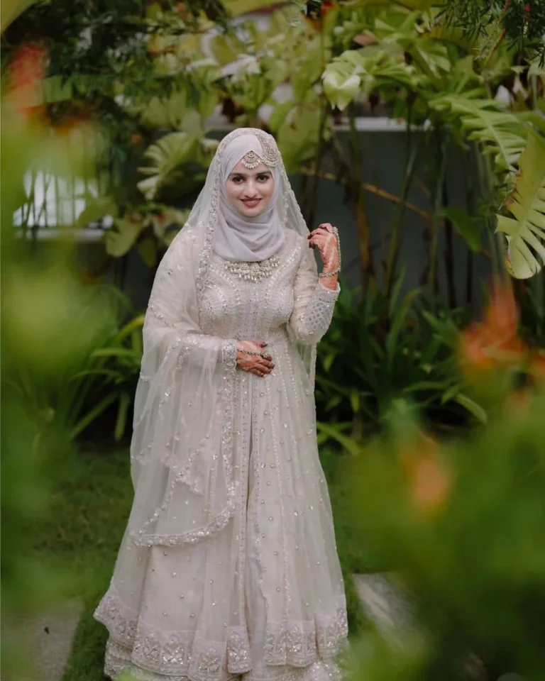 wedding photography in calicut , bride in white dress smiling